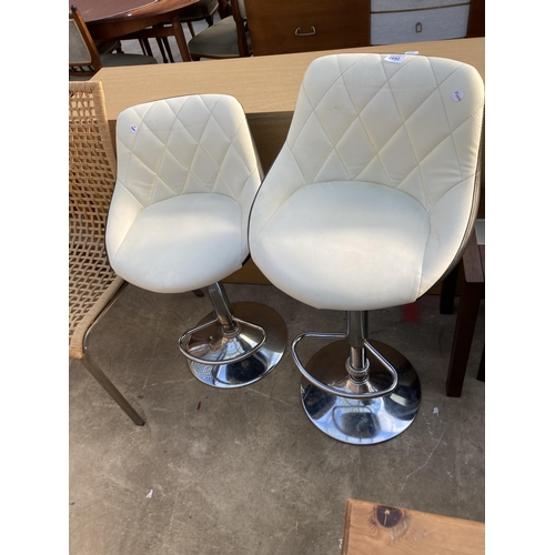 2692 - A PAIR OF PUMKP STOOLS ON POLISHED CHROME BASES