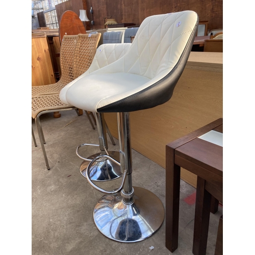 2692 - A PAIR OF PUMKP STOOLS ON POLISHED CHROME BASES