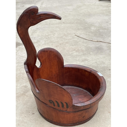 1510 - A VINTAGE CARVED TREEN BOWL WITH STORK HEAD DECORATION