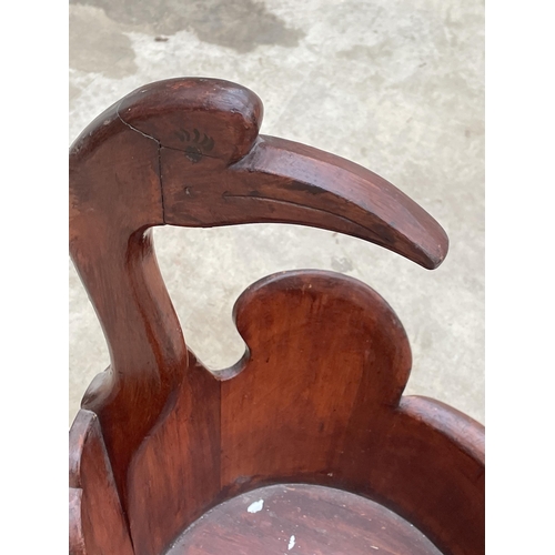 1510 - A VINTAGE CARVED TREEN BOWL WITH STORK HEAD DECORATION