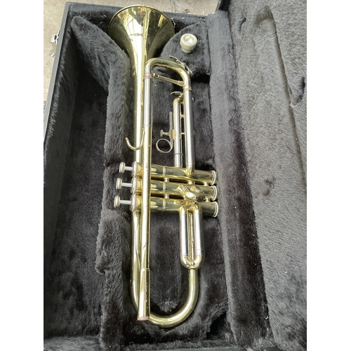 1523 - A JUPITER BRASS TRUMPET COMPLETE WITH CARRY CASE AND MOUTH PIECE