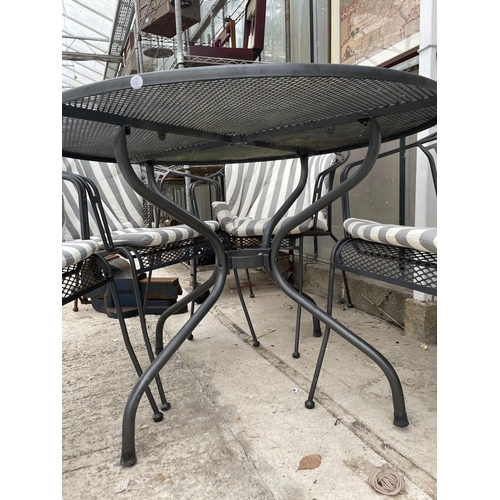 1530 - A LARGE METAL JOHN LEWIS CIRCULAR PATIO TABLE AND FOUR HEAVY METAL CHAIRS COMPLETE WITH CUSHIONS