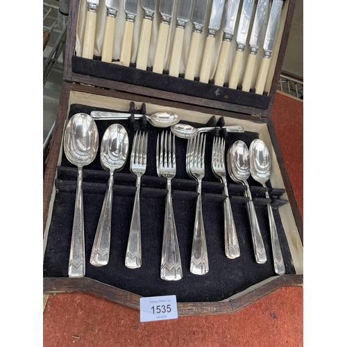 1535 - A BELIEVED COMPLETE SIX SETTING OAK CASED CANTEEN OF HALLET SILVERSMITH CUTLERY