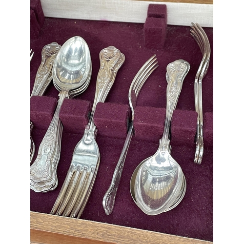 1536 - A PART COMPLETE OAK CASED CANTEEN OF CUTLERY