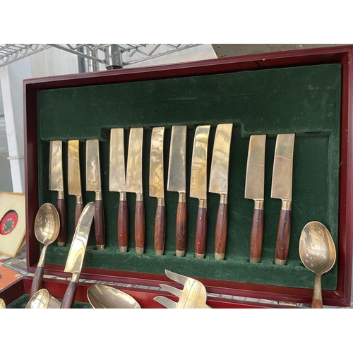 1589 - A MAHOGANY CASED CANTEEN OF CUTLERY