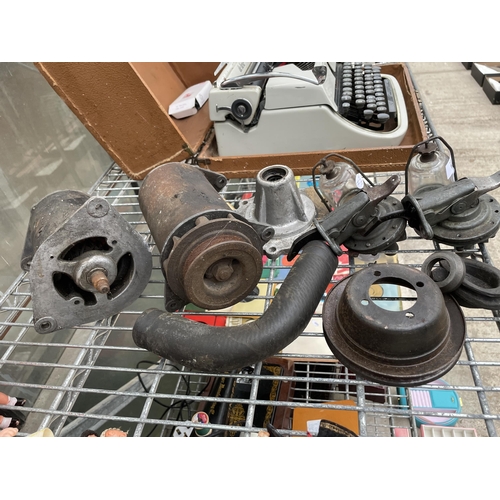 1595 - AN ASSORTMENT OF VINTAGE VEHICLE SPARES TO INCLUDE STARTER MOTORS AND FILTERS ETC