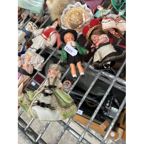 1596 - A LARGE ASSORTMENT OF VARIOUS VINTAGE DOLLS