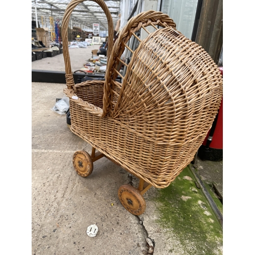 1614 - A SMALL VINTAGE WICKER DOLLS PRAM