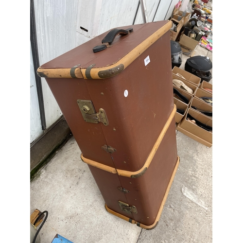 1624 - A VINTAGE COMPRESSED FIBRE TRAVEL TRUNK WITH WOODEN BANDING