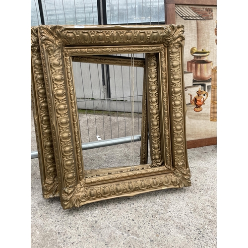 1640 - A PAIR OF DECORATIVE GILT PICTURE FRAMES