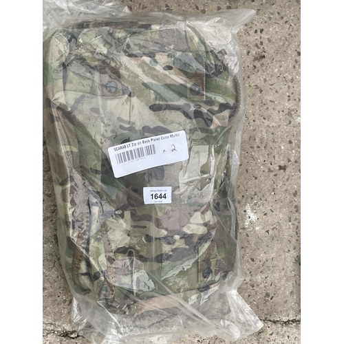 1644 - TWO VELOCITY SYSTEM CAMMO VESTS AND A CAMMO BACK PANEL CARRIER