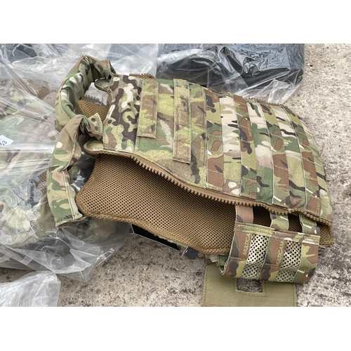 1653 - FOUR NEW AND PACKAGED SCARAB CAMMO LT CARRIER FRONT FLAP VESTS