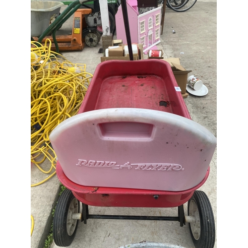 1960 - A RADIO FLYER FOUR WHEELED PULL ALONG TROLLEY