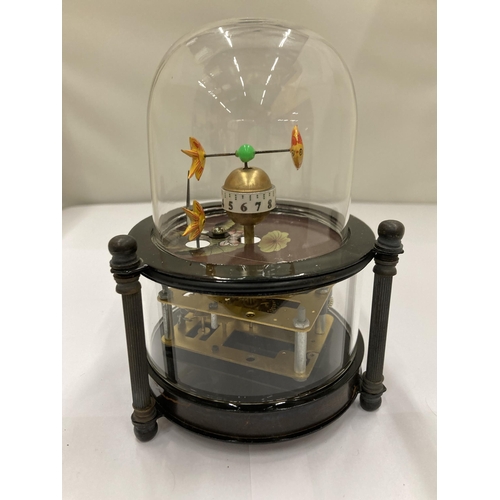 101 - A BRASS AND GLASS AQUA MARINE DOMED CLOCK