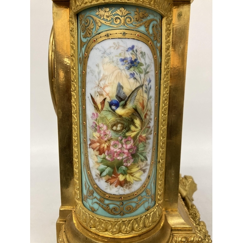 14A - A FRENCH J. MAYER ORMOLU PORCELAIN AND GILT METAL MANTEL CLOCK WITH URN STYLE GARNITURE IN THE LOUIS... 