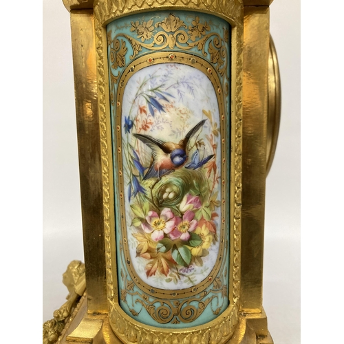 14A - A FRENCH J. MAYER ORMOLU PORCELAIN AND GILT METAL MANTEL CLOCK WITH URN STYLE GARNITURE IN THE LOUIS... 