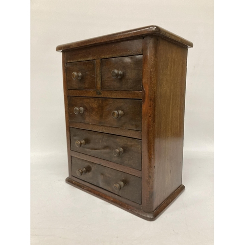 18A - A VICTORIAN MAHOGANY MINIATURE CHEST OF THREE LONG AND TWO SHORT DOORS WITH INLAY TO THE TOP (POSSIB... 