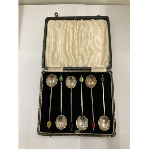 20 - A SET OF SIX HALLMARKED BIRMINGHAM COFFEE BEAN SPOONS IN A CASE PLUS