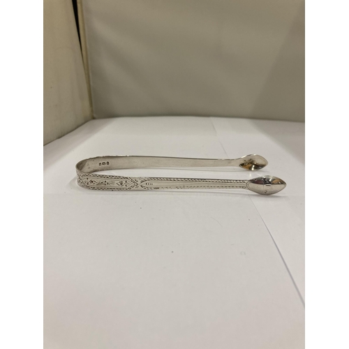 23A - TWO HALLMARKED SILVER SUGAR TONGS - GROSS WEIGHT 66 GRAMS - ONE BELIEVED EDINBURGH 1832, MAKER ROBER... 