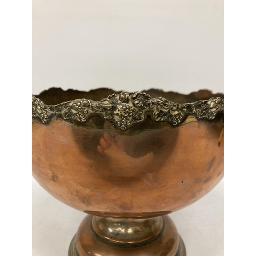 41A - A LARGE VINTAGE COPPER FOOTED BOWL WITH REPOUSSE DECORATION TO THE RIM, HEIGHT 20CM, DIAMETER 26CM