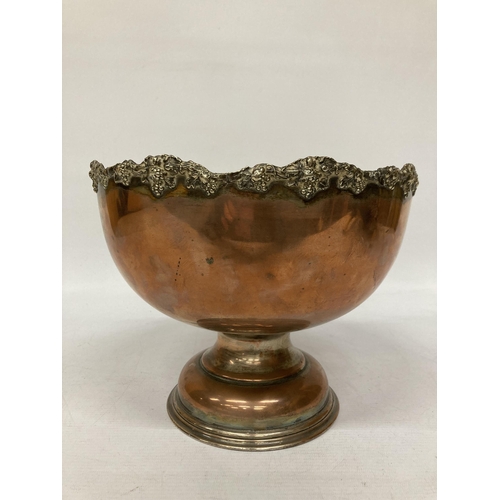 41A - A LARGE VINTAGE COPPER FOOTED BOWL WITH REPOUSSE DECORATION TO THE RIM, HEIGHT 20CM, DIAMETER 26CM