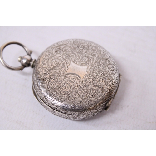 526A - A SILVER LADIES FOB WATCH WITH A DECORATIVE WHITE ENAMEL FACE AND GOLD HANDS.  HALLMARKED 0935 SILVE... 