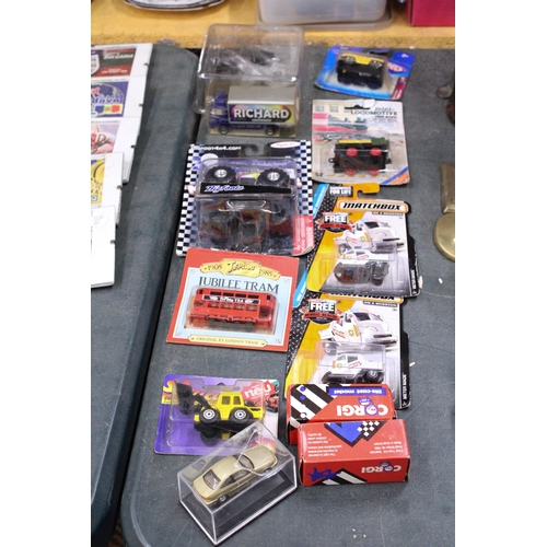 876 - TWELVE BOXED DIE CAST CARS, VANS, PLANES AND TRAINS