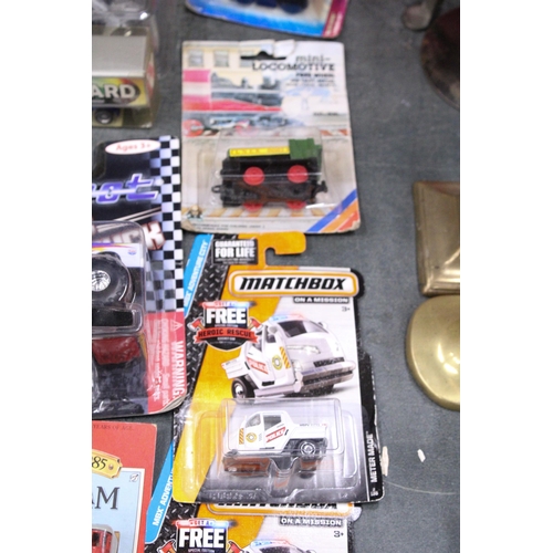 876 - TWELVE BOXED DIE CAST CARS, VANS, PLANES AND TRAINS