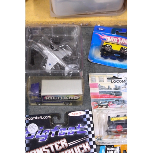 876 - TWELVE BOXED DIE CAST CARS, VANS, PLANES AND TRAINS