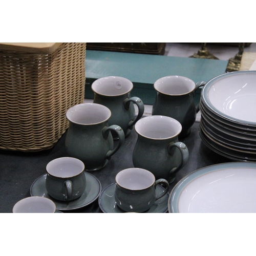 905 - A LARGE QUANTITY OF DENBY DINNERWARE TO INCLUDE PLATES, BOWLS, CUPS, MUGS, SAUCERS AND A SUGAR BOWL