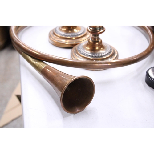 949 - A BRASS AND COPPER HUNTING HORN, PAIR OF CANDLESTICKS AND A WARMING PAN