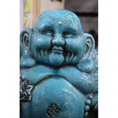 951 - A LARGE BLUE CERAMIC SITTING BUDDAH, HEIGHT APPROX 36CM