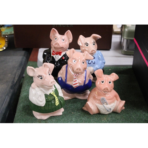 956 - A SET OF FIVE, WADE NAT WEST PIGGY BANKS