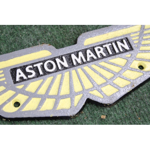 957 - A CAST ASTON MARTIN SIGN, LENGTH 34CM