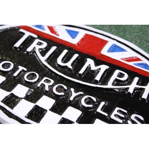 958 - A CAST TRIUMPH MOTORCYCLES SIGN, LENGTH 22CM