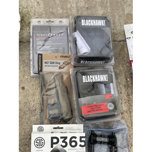 1714 - AN ASSORTMENT OF NEW AND PACKAGED ITEMS TO INCLUDE TWO P365 HOLSTERS, TWO BLACKHAWK TASER HOLSTERS A... 