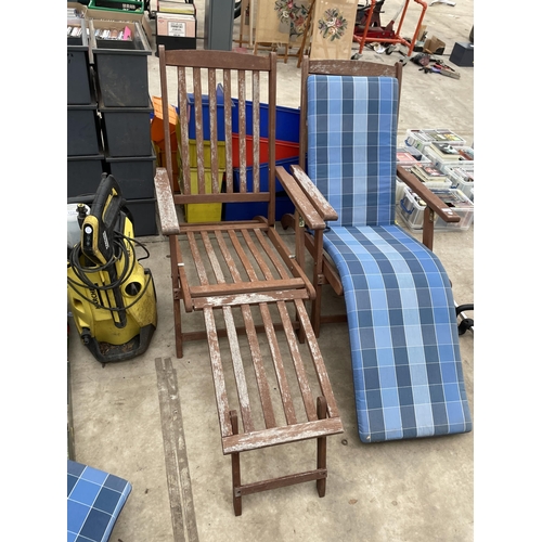 1736 - A PAIR OF TEAK FOLDING SUN LOUNGERS WITH CUSHIONS