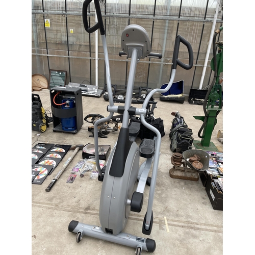 1777 - A VISION FITNESS CROSS TRAINER WITH CHARGER CABLE AND MANUAL IN THE OFFICE