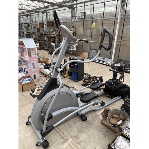 1777 - A VISION FITNESS CROSS TRAINER WITH CHARGER CABLE AND MANUAL IN THE OFFICE