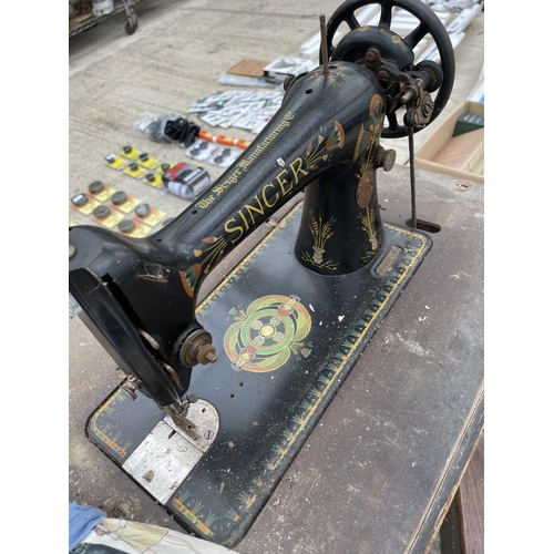 1791 - A VINTAGE SINGER SEWING MACHINE WITH TREADLE BASE AND A FURTHER WOODEN STEP/STOOL