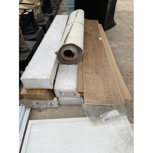 1811 - AN ASSORTMENT OF LAMINATE FLOORING AND LIGHT FITTINGS