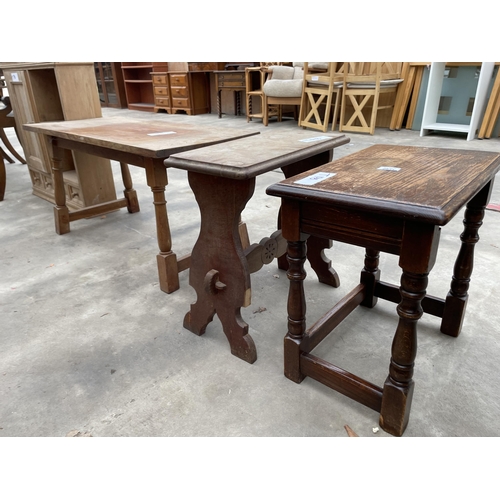 2934 - TWO SMALL OAK STOOLS AND A COFFEE TABLE