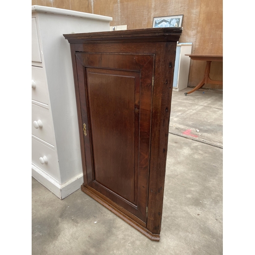 2940 - AN OAK GEORGE III CORNER CUPBOARD WITH SHAPED INTERIOR SHELVES, 24.5