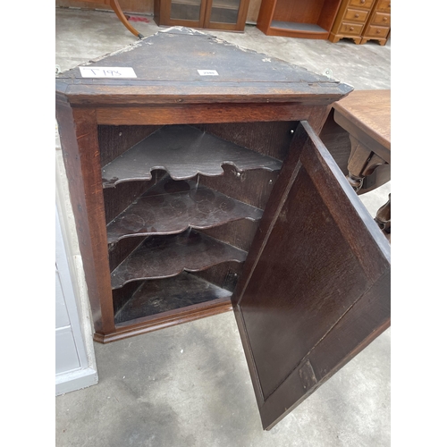 2940 - AN OAK GEORGE III CORNER CUPBOARD WITH SHAPED INTERIOR SHELVES, 24.5