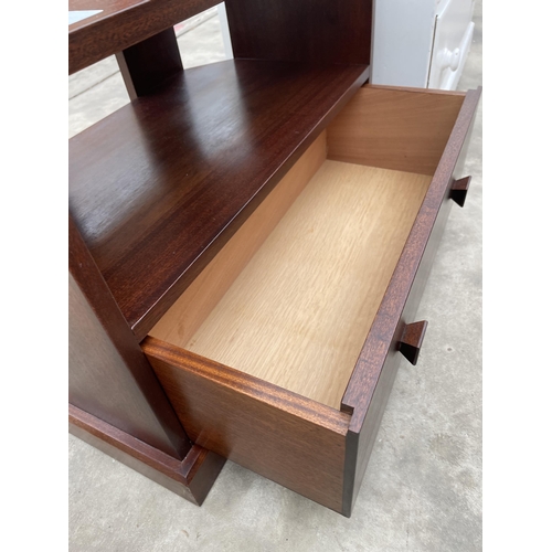 2942 - A MAHOGANY T.V. CORNER STAND, 27.5