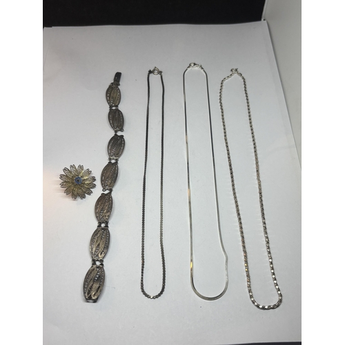 507 - THREE SILVER NECKLACES , A POSSIBLY SIILVER BRACELET AND A POSSIBLY SILVER BROOCH