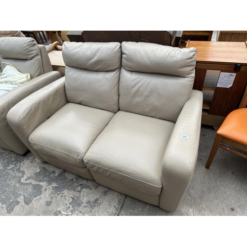 2806 - AN ITALSOFA LEATHER TWO SEATER SETTEE, ONE SECTION BEING A RECLINER