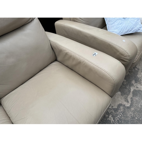 2806A - AN ITALSOFA LEATHER TWO SEATER SETTEE, ONE SECTION BEING A RECLINER