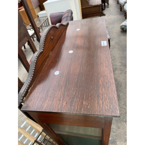 2745B - AN EARLY 20TH CENTURY OAK DISPLAY CABINET ON CABRIOLE LEGS