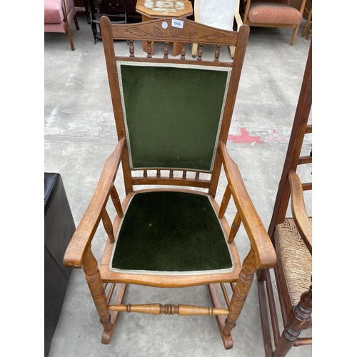 2946 - A LATE VICTORIAN ELM AND BEECH ROCKING CHAIR WITH UPHOLSTERED SEAT AND BACK